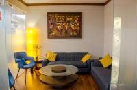 The visitors lounge behind the reception desk.